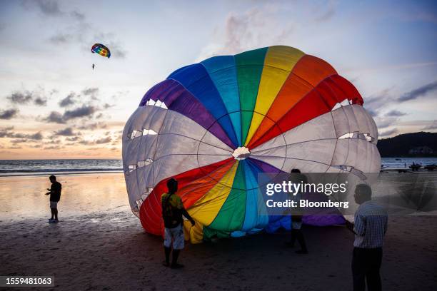 Parasailing on Patong beach in Phuket, Thailand, on Thursday, July 6, 2023. Russian nationals were the No. 1 source of tourists to the island this...