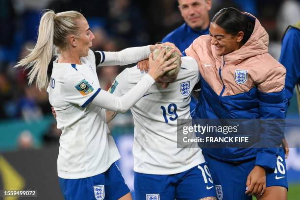 England's defender Alex Greenwood, England's forward Bethany England and England's defender Jessica Carter react at the end of the Australia and New...