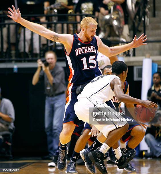 Joe Willman of the Bucknell Bison defends as Ronnie Johnson of the Purdue Boilermakers tries to drive the ball inside at Mackey Arena on November 9,...