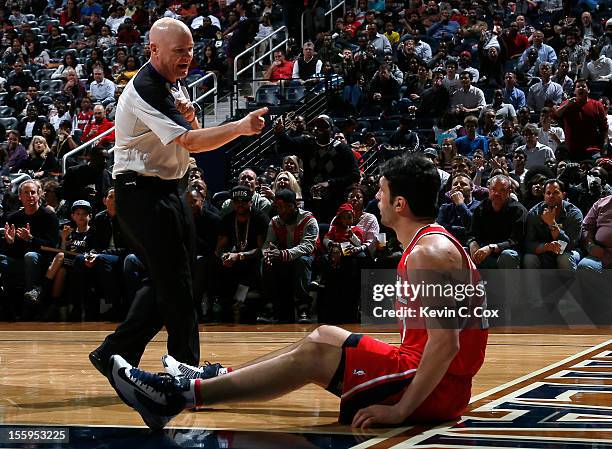 Referee Joe Crawford calls a technical foul on Zaza Pachulia of the Atlanta Hawks against the Miami Heat at Philips Arena on November 9, 2012 in...