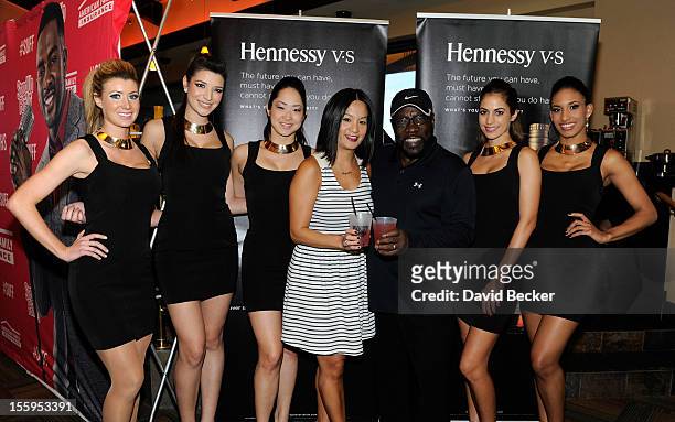 Hennessy's west coast marketing manager Thuy-Anh Nguyen and singer Eddie Levert attend the first annual Soul Train Celebrity Golf Invitational...