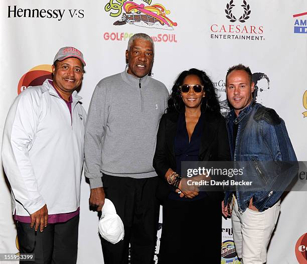 Legend Julius Erving and singer Jody Watley attend the first annual Soul Train Celebrity Golf Invitational presented by Hennessy at the Las Vegas...