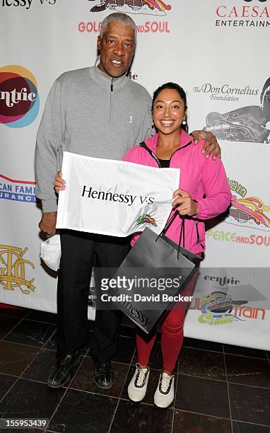 Legend Julius Erving and Nisha Sadekar attend the first annual Soul Train Celebrity Golf Invitational presented by Hennessy at the Las Vegas Paiute...