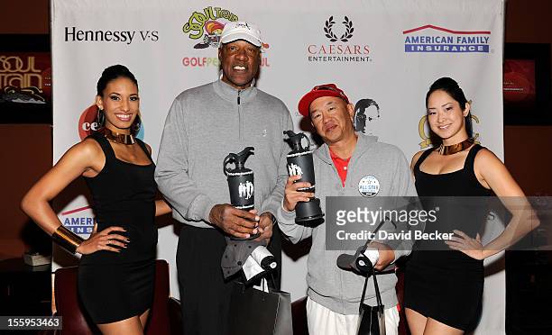 Legend Julius Erving and Hwa Wu attend the first annual Soul Train Celebrity Golf Invitational presented by Hennessy at the Las Vegas Paiute Golf...