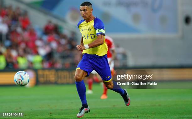 Cristiano Ronaldo of Al Nassr in action during the Pre-Season Friendly match between Al Nassr and SL Benfica at Estadio Algarve on July 20, 2023 in...