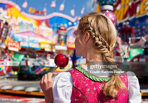 woman with braided hair at beer fest, munich - oktoberfest stock-fotos und bilder