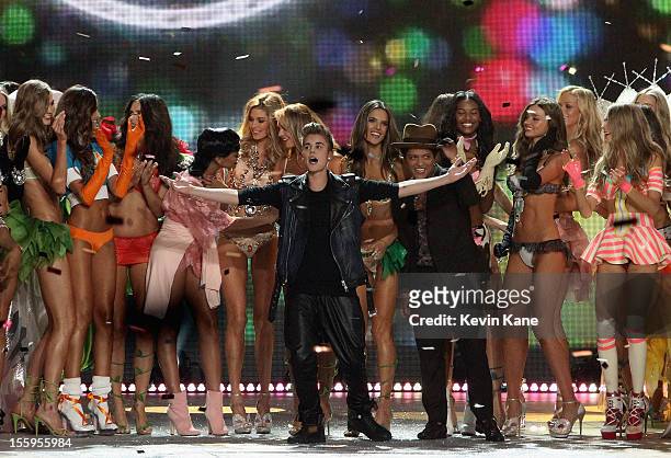 Rihanna, Justin Bieber, Bruno Mars, and models onstage during the 2012 Victoria's Secret Fashion Show at the Lexington Avenue Armory on November 7,...