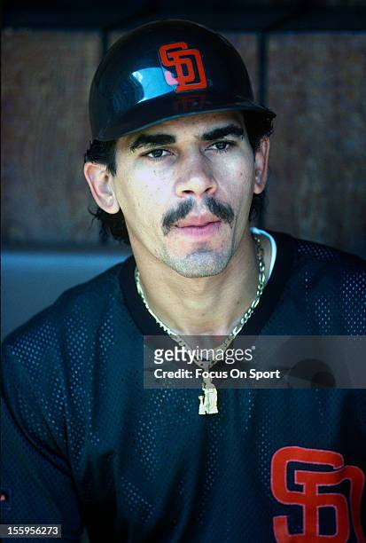 Benito Santiago of the San Diego Padres looks on from the dugout during batting practice before a Major League Baseball game against the New York...