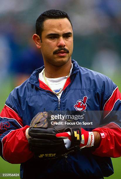 Carlos Baerga of the Cleveland Indians looks on during batting practice before a Major League Baseball game against the Baltimore Orioles circa 1995...