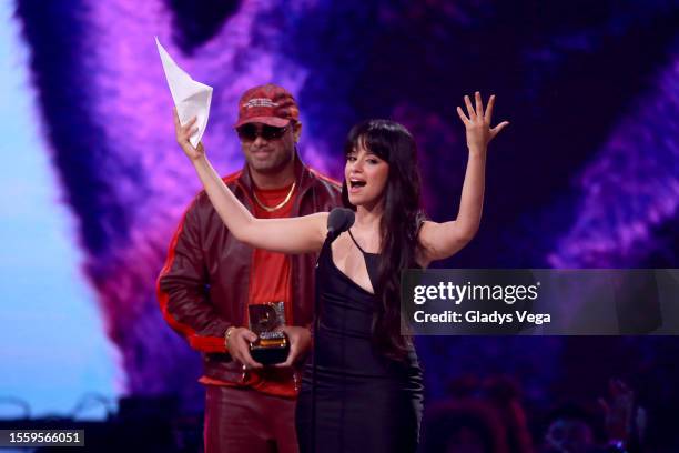 Wisin and Camila Cabello speak onstage during the 2023 Premios Juventud Awards at Coliseo de Puerto Rico José Miguel Agrelot on July 20, 2023 in San...