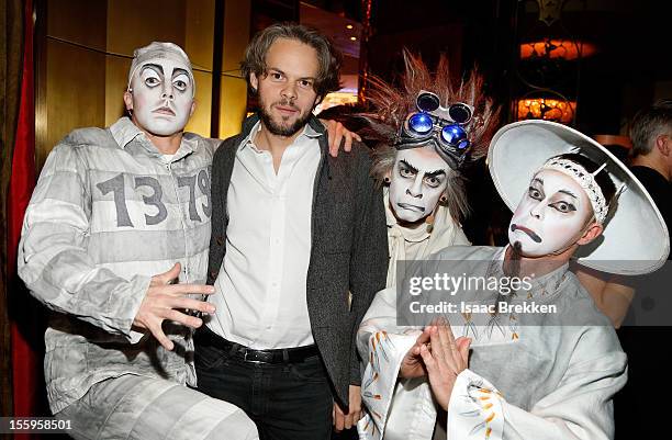 Composer and musical director Nick Littlemore appears with "Zarkana by Cirque du Soleil" characters at the reception for the Las Vegas premiere of...