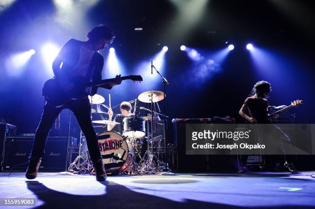 Steven Battelle, Mark Gibson and Alan Williamson of the band Lost Alone performs on stage at Wembley Arena on November 9, 2012 in London, United...