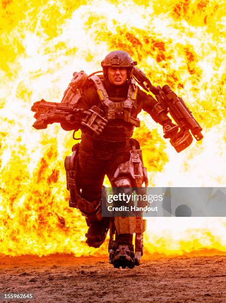 In this handout photo provided by Warner Brothers Pictures and Village Roadshow Pictures, Tom Cruise plays Lieutenant Colonel Bill Cage, a soldier...