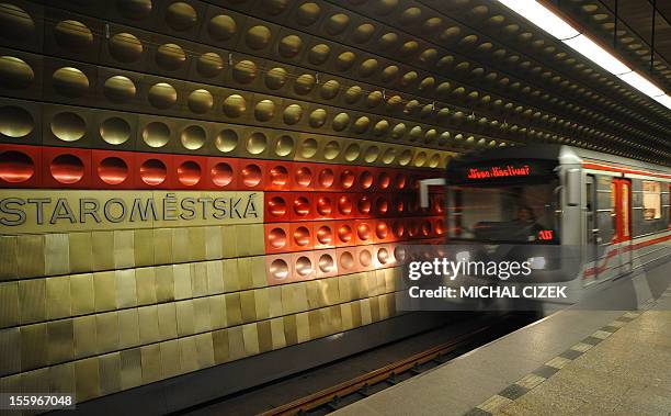 Train leaves the Staromestska station on the B line subway in Prague, Czech Republic on November 09, 2012. AFP PHOTO / MICHAL CIZEK