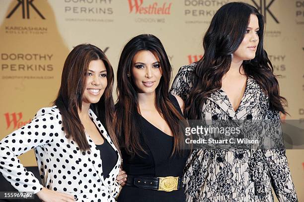 Kourtney Kardashian, Kim Kardashian and Khloe Kardashian Odom attend the photocall to launch the Kardashian Kollection for Dorothy Perkins at...