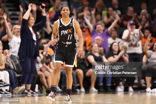 Shey Peddy of the Phoenix Mercury reacts to a three-point shot against the Chicago Sky during the second half of the WNBA game at Footprint Center on...