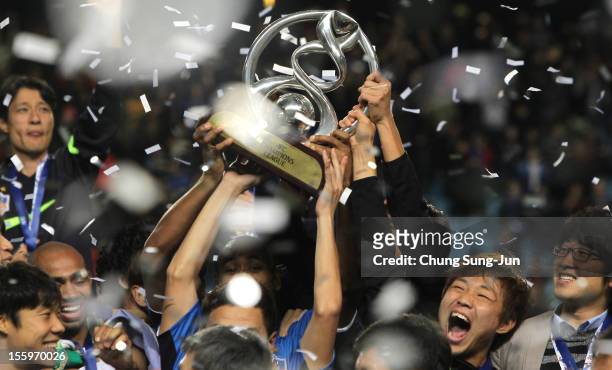 Ulsan Hyundai players celebrate with the AFC Champions League Final Tropy after winning the 2012 AFC Champions League final between Ulsan Hyundai and...