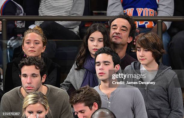 Mary-Kate Olsen, Olivier Sarkozy and his children attend the Dallas Mavericks vs New York Knicks game at Madison Square Garden on November 9, 2012 in...