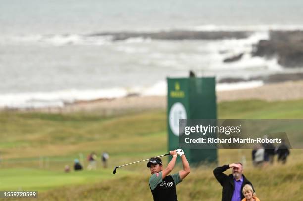 Hiroyuki Fujita of Japan hits an approach shot during Day Two of The Senior Open Presented by Rolex at Royal Porthcawl Golf Club on July 28, 2023 in...