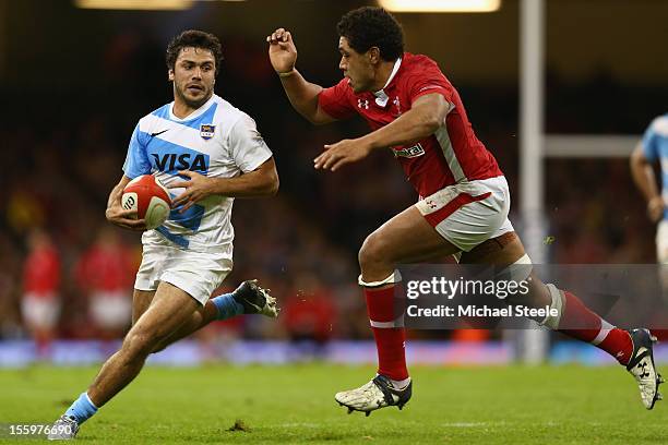 Martin Landajo of Argentina looks to find a way past Toby Faletau of Wales during the Wales versus Argentina International match at the Millennium...