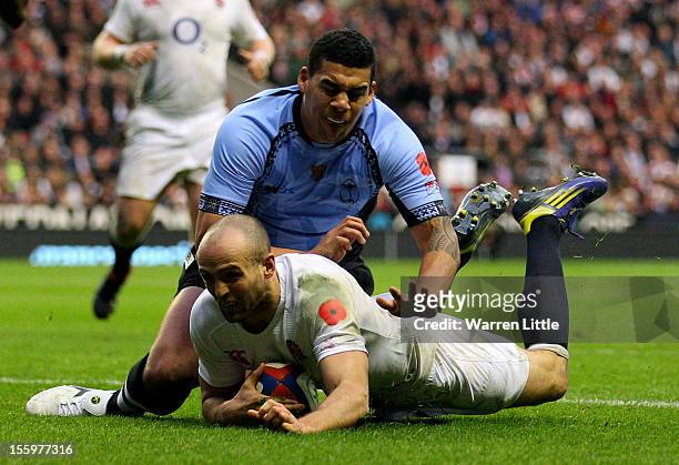 Charlie Sharples of England dives to score a try during the QBE international match between England and Fiji at Twickenham Stadium on November 10,...