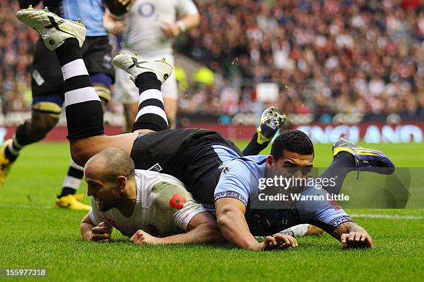 Charlie Sharples of England dives to score a try during the QBE international match between England and Fiji at Twickenham Stadium on November 10,...