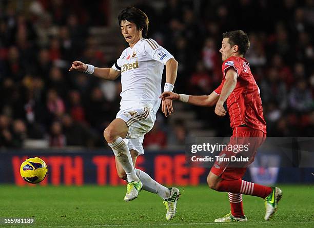 Morgan Schneiderlin of Southampton and Ki Sung-Yong of Swansea City in action during the Barclays Premier League match between Southampton and...