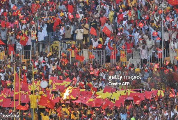 Sudan's al-Merrikh club fans gather to watch their team play against Congo's AC Leopards during their CAF Confederation Cup semi-final football match...