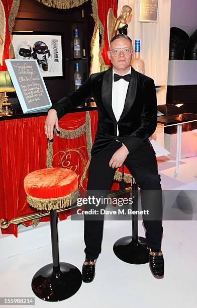 Fashion designer Giles Deacon arrives at the Grey Goose Winter Ball at Battersea Power Station on November 10, 2012 in London, England.