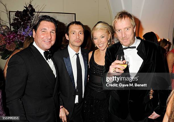 Giorgio Veroni, Dan Macmillan, Tamara Beckwith and Rhys Ifans attend the Place For Peace dinner co-hosted by Ella Krasner and Forest Whitaker to...