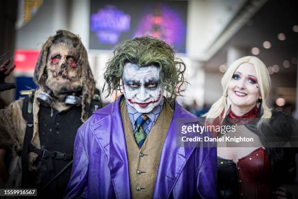Batman cosplayers Brian Messick as Scarecrow, Duan King as The Joker, Alisa Rhead as Harley Quinn pose at Comic-Con International 2023 on July 20,...