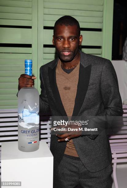 Rapper Wretch 32 arrives at the Grey Goose Winter Ball at Battersea Power Station on November 10, 2012 in London, England.