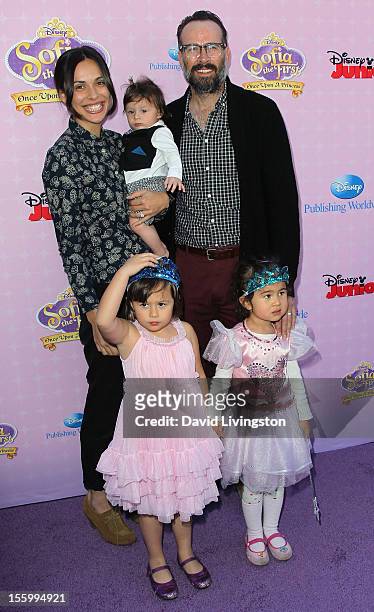 Actor Jason Lee with wife Ceren Alkac holding son Sonny pose at the premiere of Disney Channels' "Sofia The First: Once Upon a Princess" at Walt...