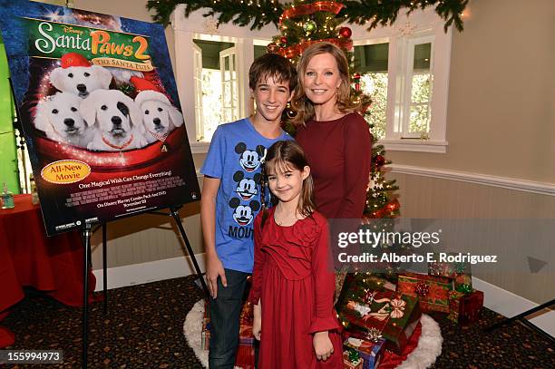 Actors Josh Feldman, Kaitlyn Maher, and Cheryl Ladd attend the "Santa Paws 2: The Santa Pups" holiday party hosted by Disney, Cheryl Ladd, and Ali...