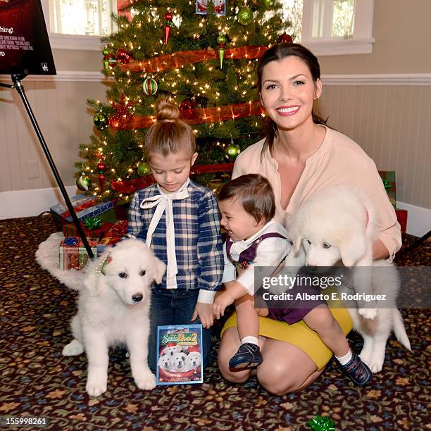 Host Ali Landry with her daughter Estela and son Marcelo attend the "Santa Paws 2: The Santa Pups" holiday party hosted by Disney, Cheryl Ladd, and...