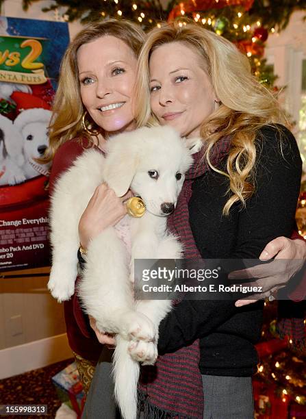 Actresses Cheryl Ladd and Jordan Ladd attend the "Santa Paws 2: The Santa Pups" holiday party hosted by Disney, Cheryl Ladd, and Ali Landry at The...