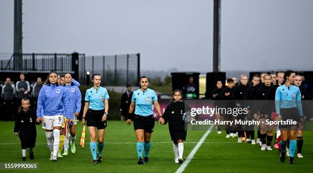 Referee Sabina Bolic leads out the teams before the UEFA Women's European Under-19 Championship 2022/23 semi-final match between France and Germany...