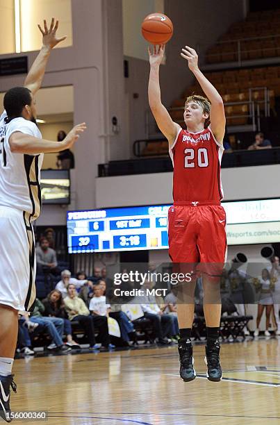 Youngstown State forward Bobby Hain hits a three-point jump shot against George Washington University in the first half at the Smith Center in...