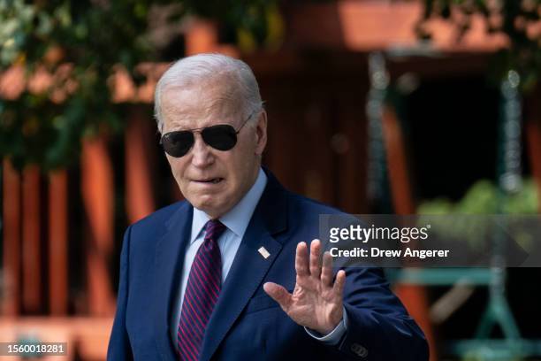 President Joe Biden waves to the press as he walks to Marine One on the South Lawn of the White House July 28, 2023 in Washington, DC. President...