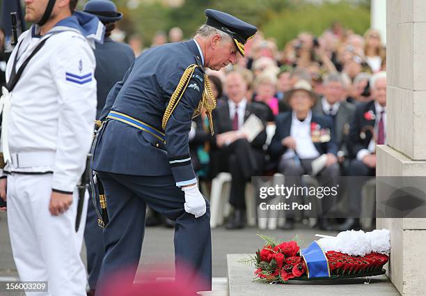 Prince Charles, Prince of Wales lays a wreath as he attends an Armistice Day Commemoration at the Auckland War Memorial on November 11, 2012 in...