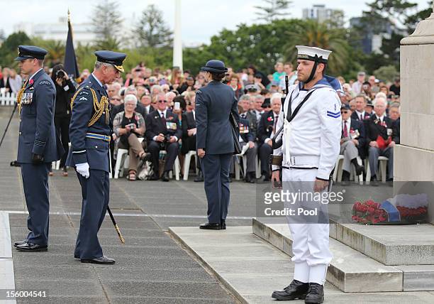 Prince Charles, Prince of Wales lays a wreath as he attends an Armistice Day Commemoration at the Auckland War Memorial on November 11, 2012 in...