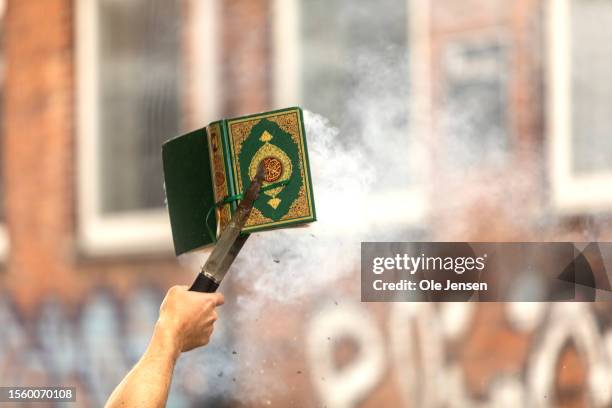 Quran is burned by an activist from the small right-wing group, Danish Activists, on July 28, 2023 in Copenhagen, Denmark. Six Quran burnings were...