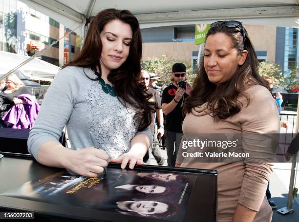 Author/producer Stephenie Meyer signs autographs at The Twilight Saga: Breaking Dawn Part 2" Fan Camp at L.A. LIVE on November 11, 2012 in Los...