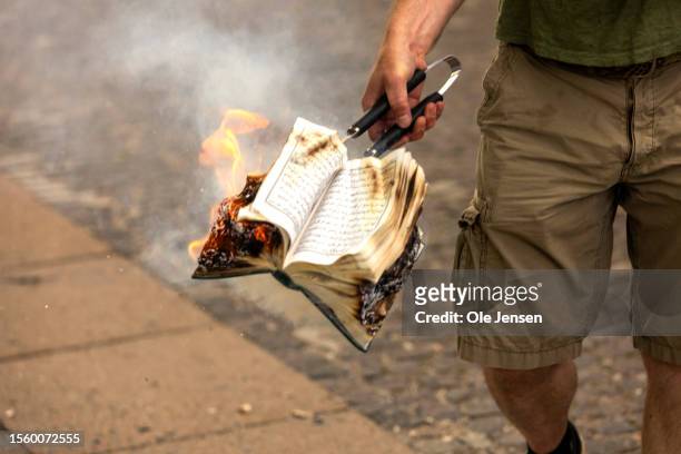 Quran is burned by an activist from the small right-wing group, Danish Activists, on July 28, 2023 in Copenhagen, Denmark. Six Quran burnings were...