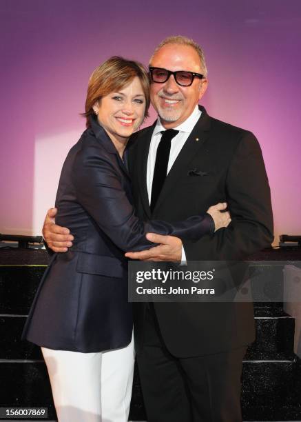 Woman of Substance and Style Honoree Dorothy Hamill poses with celebrity presenter Emilio Estefan at Destination Fashion 2012 To Benefit The...