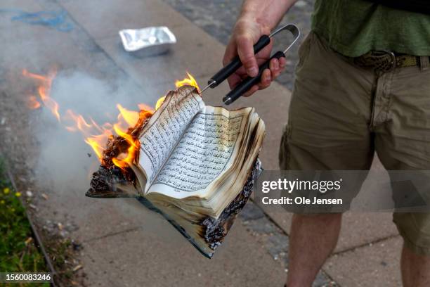 Quran is burned by an activist from the small right-wing group, Danish Activists, on July 28, 2023 in Copenhagen, Denmark. Six Quran burnings were...