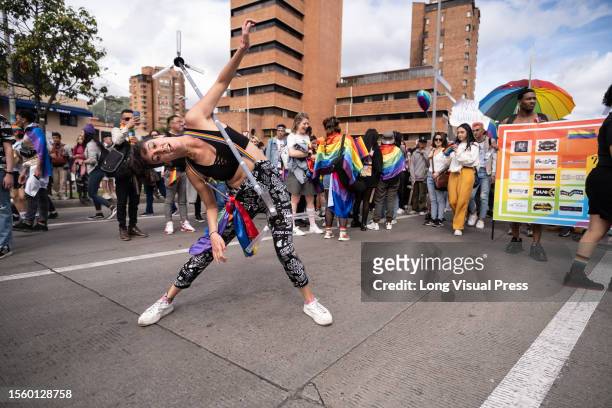 Community members and supporters take part during the International Pride Parade in Bogota, Colombia, July 2, 2023.
