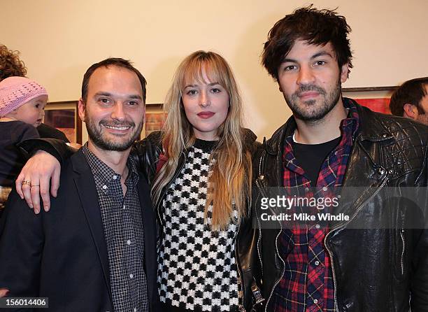 Photographer Jeff Vespa, actress Dakota Johnson and actor Jordy Masterson pose during "HOURS" New Drawing Show Hosted By Amanda De Cadenet at Richard...