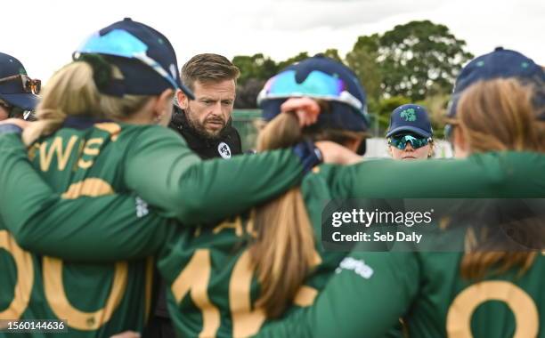 Dublin , Ireland - 28 July 2023; Ireland head coach Ed Joyce talks to his players after match three of the Certa Women's One Day International...