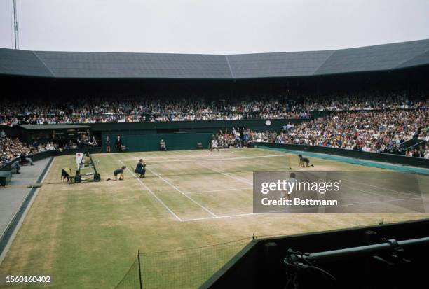 Tennis players Arthur Ashe and Jimmy Connors competing in the men's singles final of the Wimbledon Tennis Championships in London, July 5th 1975.